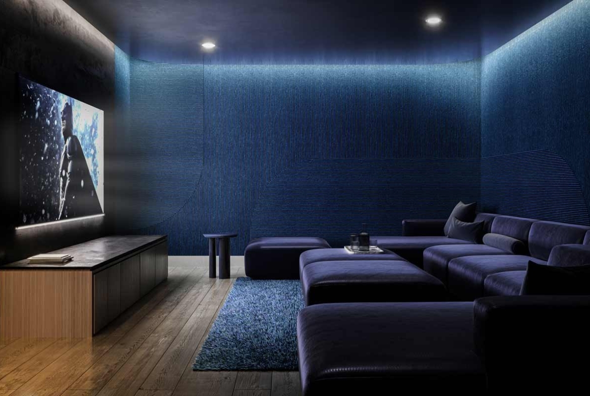 A home theater room with blue walls and a TV. New homes in Gta, Pre construction Homes, New condos in Gta.