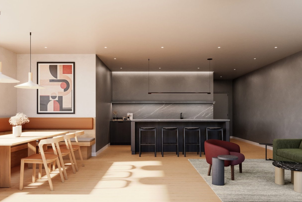 Modern open-plan apartment interior with a kitchen featuring a marble countertop and black stools, a dining area with a wooden table and benches, and a living area with a green sofa, all under warm lighting