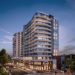 A modern, multi-story apartment building with numerous glass balconies is illuminated at dusk. The building has a sleek design with curved edges and ground-floor businesses. Surrounding it are well-lit streets, cars, trees, and pedestrians, showcasing the allure of new condos in GTA.