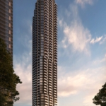 A tall modern skyscraper with multiple balconies, identified as Gagan Bector, stands against a dusk sky, surrounded by trees and a few people on a city street.