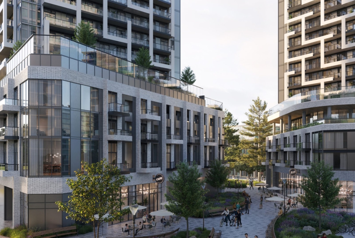 A group of people walking in a courtyard.