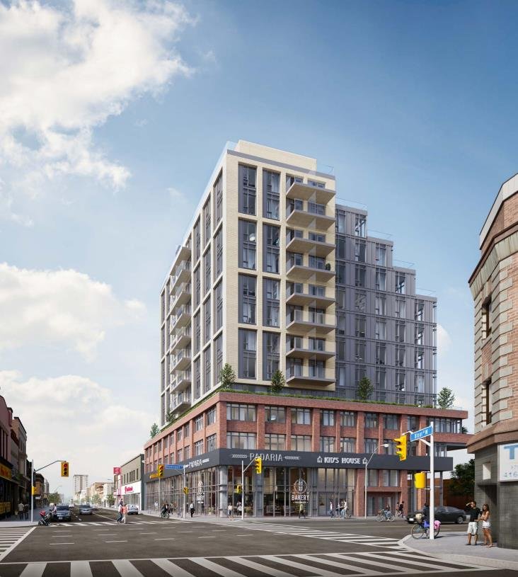 A modern multi-story building with a combination of glass and brick exterior stands at a street corner. The ground floor has shops and a restaurant with outdoor seating. People are walking on the sidewalk, cars are driving on the street, and nearby new condos in GTA add to the vibrant atmosphere. The sky is partly cloudy.