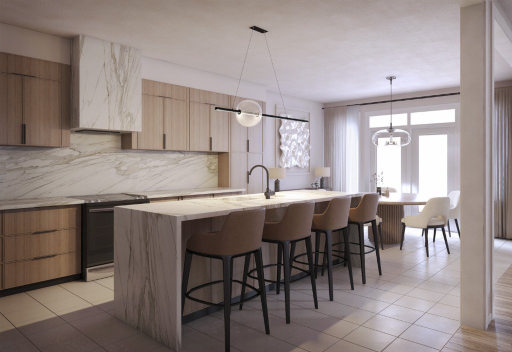Modern kitchen with marble countertops, wooden cabinets, and a breakfast bar with stools. Pendant lights hang above, and there is an adjacent dining area. This feature is typical in New Homes in GTA.