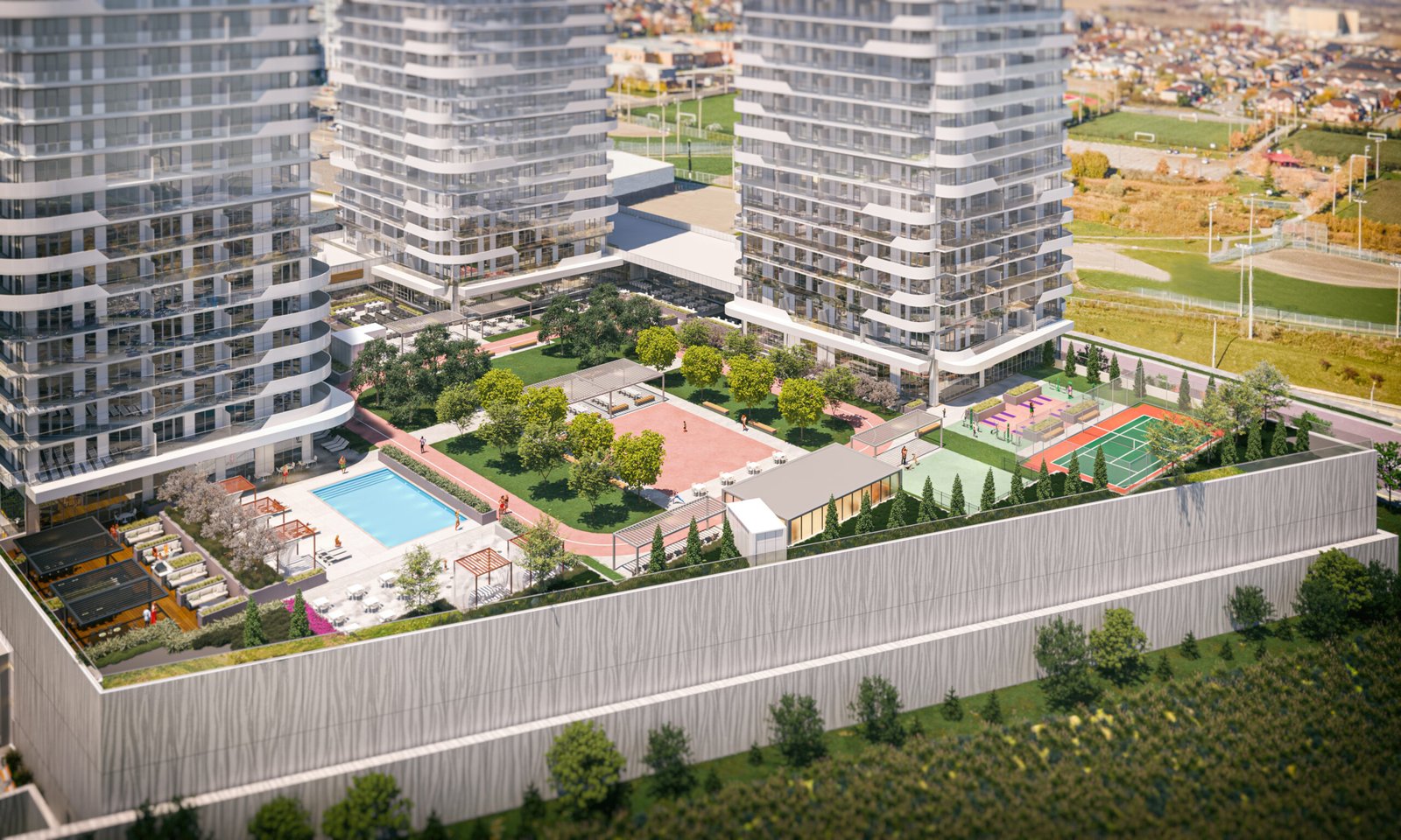 Aerial view of a modern residential complex with tall buildings surrounding a recreational area. The courtyard features a swimming pool, basketball court, tennis court, lush greenery, and various seating areas. Nearby new condos in GTA offer open fields and additional buildings.