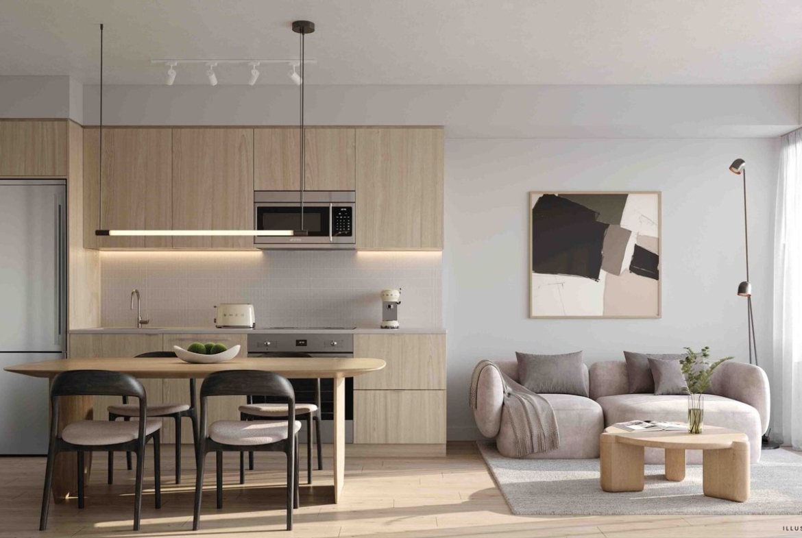 A modern apartment interior featuring a light wood kitchen with black stools, an adjoining living area with a gray sofa, coffee table, and a large window with balcony access showcases new condos.