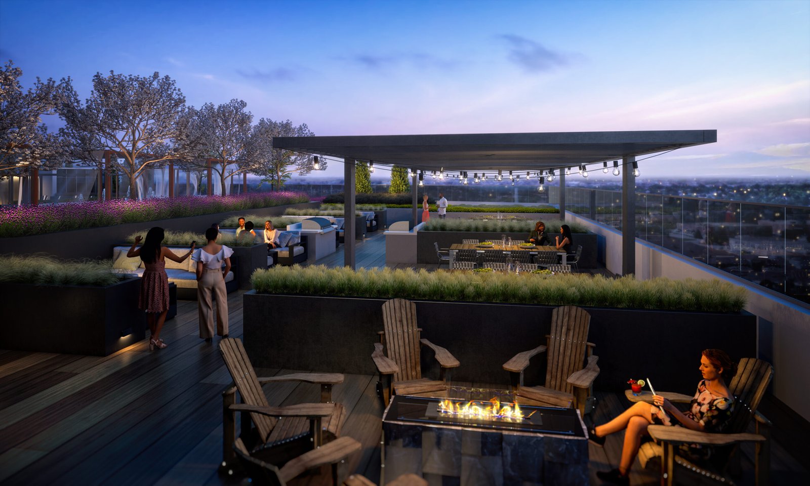 A rooftop terrace at dusk, featuring people socializing around a fire pit, sitting at tables, and enjoying the view of new condos in GTA. The space has modern furniture, plants, and string lights under a pergola, creating a cozy ambiance. Trees and a cityscape are visible in the background.