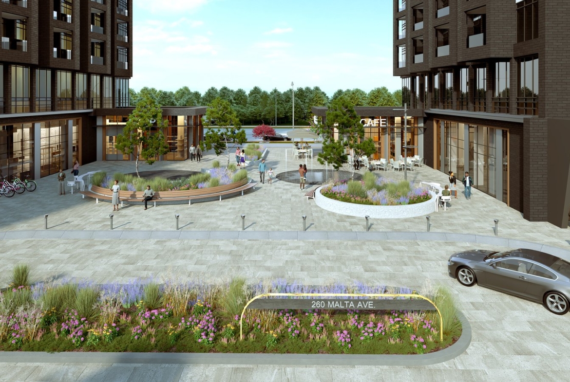 Computer-generated image of an urban plaza featuring New condos, landscaped areas with benches, a central fountain, pedestrians, and parked cars. A sign reads "2601 Malta Ave.