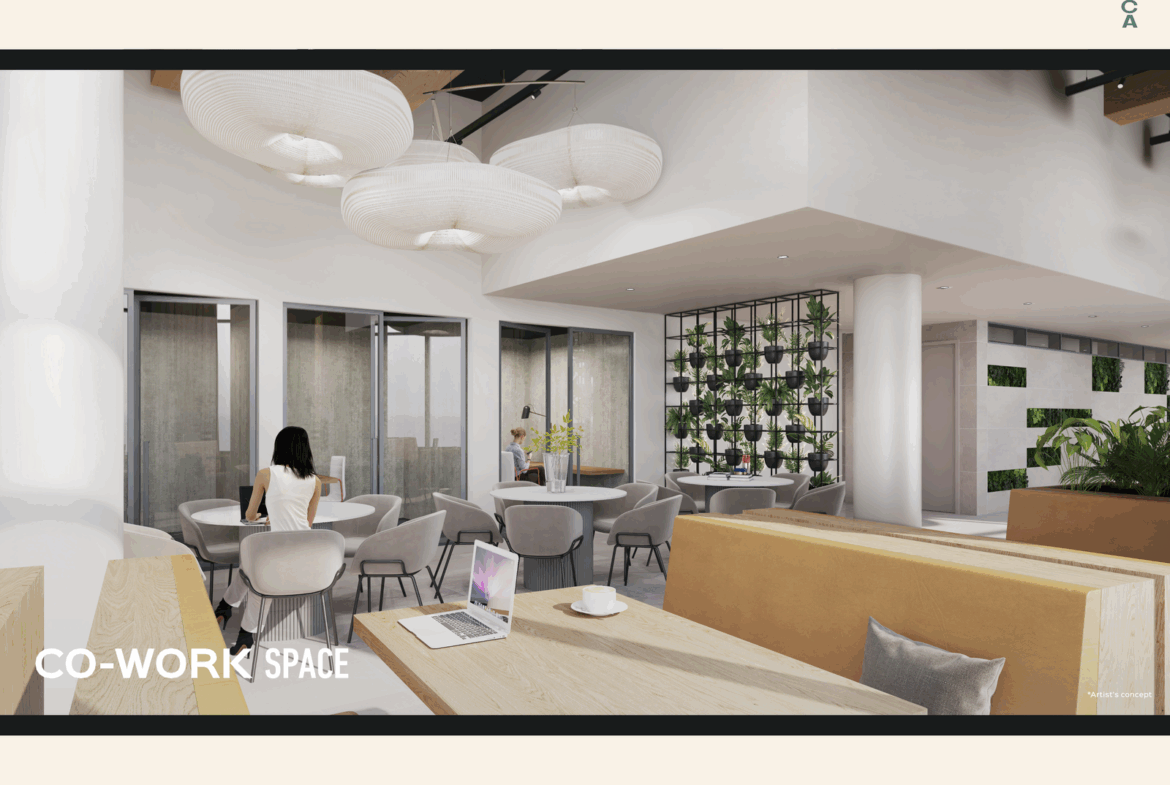 A modern coworking space featuring a mix of seating options including chairs and sofas. A woman sits at a table with her back to the camera, while a laptop is open on a nearby table. The room includes plants, large pendant lights, and contemporary decor. Text reads "CO-WORK SPACE," reflecting the innovation seen in new condos in GTA.