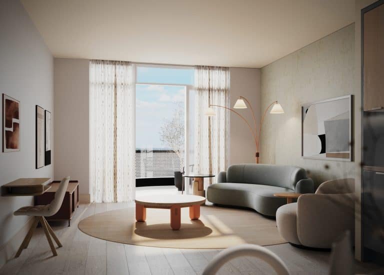 A modern living room featuring a light gray sofa, circular wooden coffee table, and matching armchair. The room has large windows with sheer curtains allowing natural light to flood in. A minimalistic floor lamp with three shades stands next to the sofa. Crosstown artwork decorates the walls.