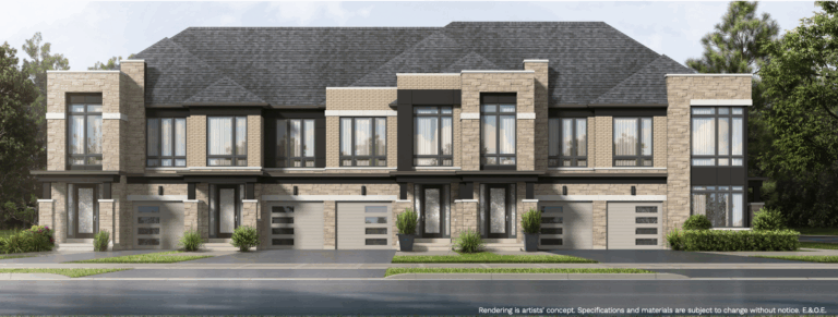 A row of modern two-story townhouses with brick and stone exteriors stands proudly, featuring large windows and single garages. These new homes are set against a backdrop of trees under a clear sky.