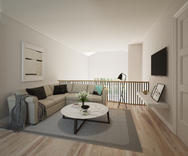 A modern living room in one of the new condos in GTA features a beige sectional sofa with black cushions and a gray throw. A round marble coffee table rests on a gray rug. A flat-screen TV is mounted on the wall, and a floor lamp stands beside a railing overlooking greenery.