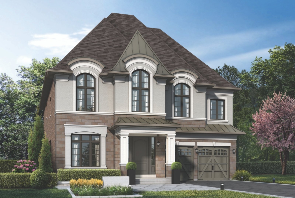 A beautiful two-story house in Toronto showcases a stunning blend of stone and stucco exterior, with tall arched windows and a steep hip roof. The property includes a garage amidst green shrubs and a blooming tree, all framed by lush trees against a clear blue sky. Perfect for those seeking new homes.