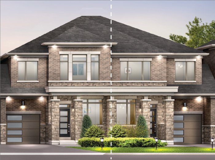 A modern two-story brick duplex, showcasing new homes architecture with large windows and two garages on each side. The symmetrical building is complemented by manicured shrubs and bushes in the front yard, offering an inviting aesthetic.