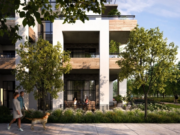 A modern condo building, Mile & Creek, boasts large balconies enveloped by lush trees and greenery. Two people relax on a balcony while another walks their dog on the sunlit sidewalk, creating a blissful scene.