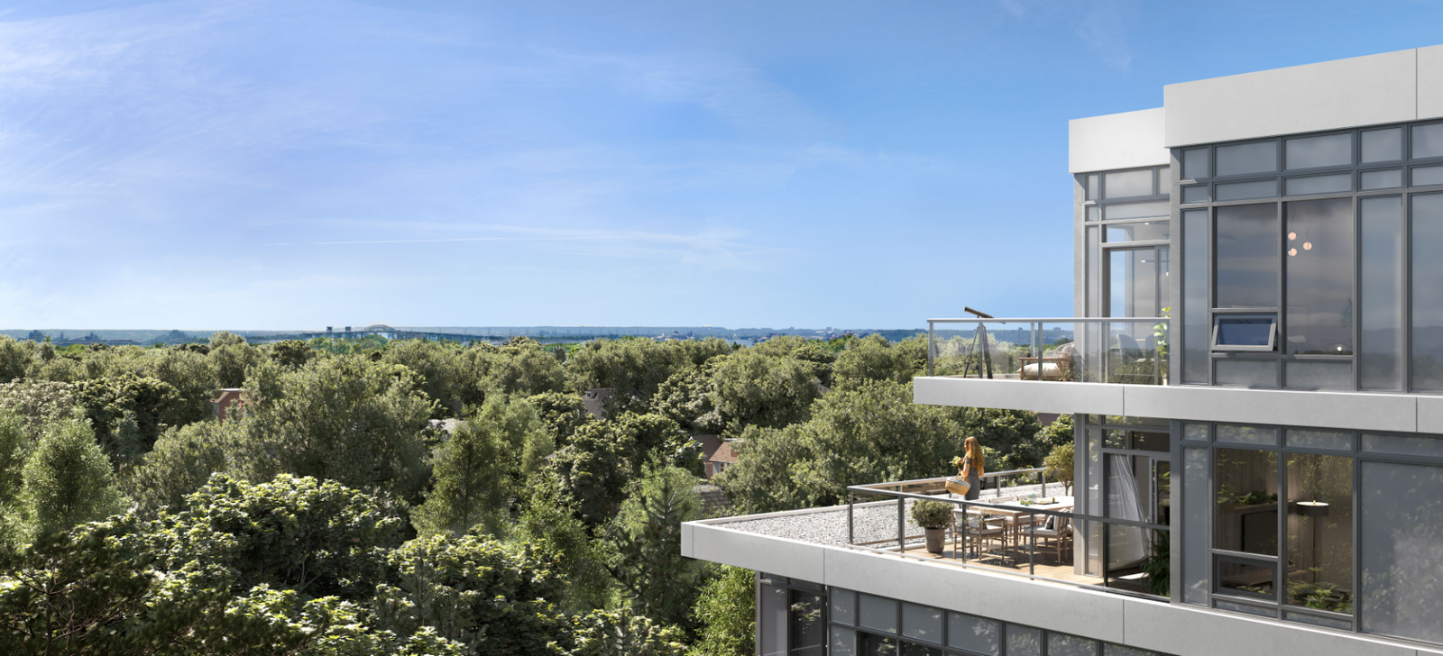 A modern, multi-story building with large glass windows and balconies overlooks a lush green forest. A person stands on a balcony enjoying the view under a clear blue sky, epitomizing the appeal of new homes in Brampton for those craving a scenic escape. A modern, multi-story building with large glass windows and balconies overlooks a lush green forest. A person stands on a balcony enjoying the view under a clear blue sky, epitomizing the appeal of new homes in Brampton for those craving a scenic escape.