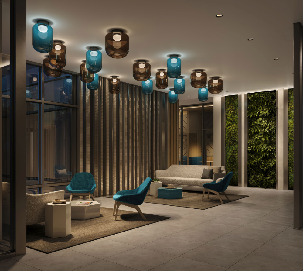 The modern lobby boasts contemporary furniture, featuring blue and brown chairs, sofas, and small tables on a tiled floor. The ceiling showcases blue and brown pendant lights, while a vertical garden enhances one wall’s elegance. Explore the charm of new homes in Toronto with this inviting design. The modern lobby boasts contemporary furniture, featuring blue and brown chairs, sofas, and small tables on a tiled floor. The ceiling showcases blue and brown pendant lights, while a vertical garden enhances one wall's elegance. Explore the charm of new homes in Toronto with this inviting design.