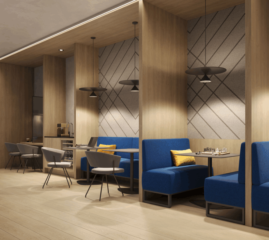 A modern lounge area with wooden interiors features blue booths with yellow cushions, round tables, and gray chairs. Geometric wall patterns and pendant lights create a cozy ambiance, perfect for those exploring new homes in Toronto.