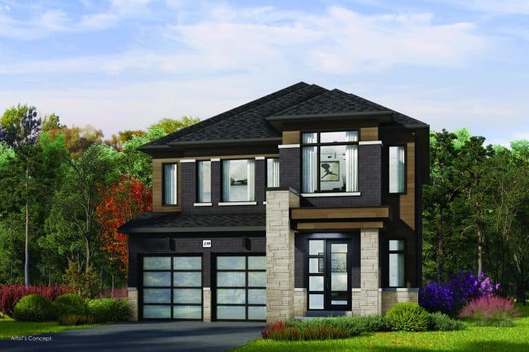 A modern two-story house with a dark gray roof and large windows stands as a testament to Oakridge's design. The exterior, featuring a blend of stone and wood siding, is surrounded by colorful trees and shrubs under a clear blue sky—a perfect example of Oakridge Green Homes' commitment to nature.