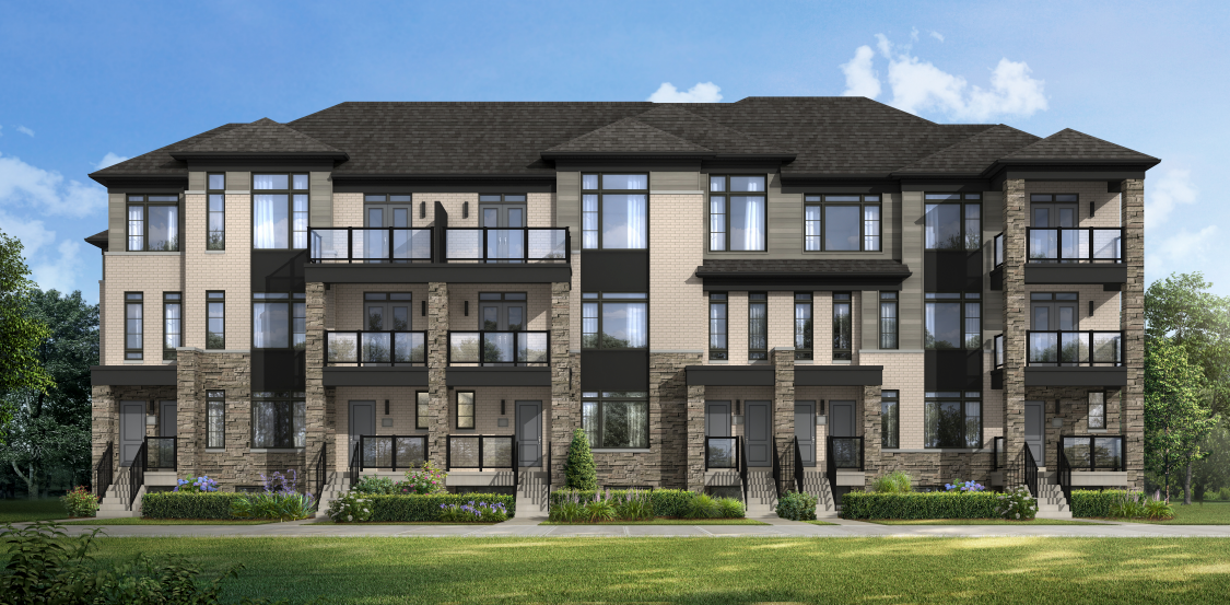 Discover new homes in Brampton with this modern, three-story residential building. It features beige and gray stonework, black trim, and multiple balconies. Nestled amidst lush greenery under a partly cloudy sky, it's an ideal setting for those seeking contemporary living.