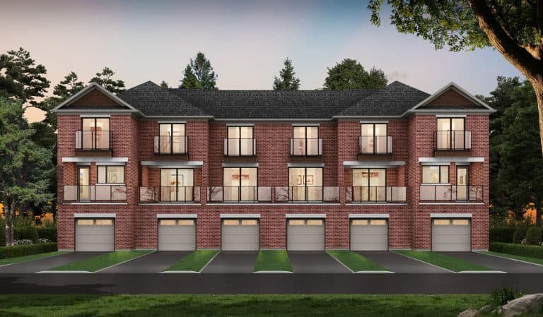 A row of three-story brick townhouses in South Barrie boasts multiple balconies, large windows, and garages on the ground floor. The scene is set at dusk, with a soft ambient light filtering through the trees around these elegant towns.