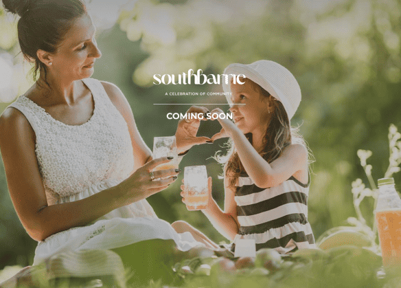 A woman and a child enjoy a picnic outdoors, holding drinks and smiling at each other. They are surrounded by greenery, with sunlight filtering through the trees. Text overlays say "South Barrie Towns" and "COMING SOON.