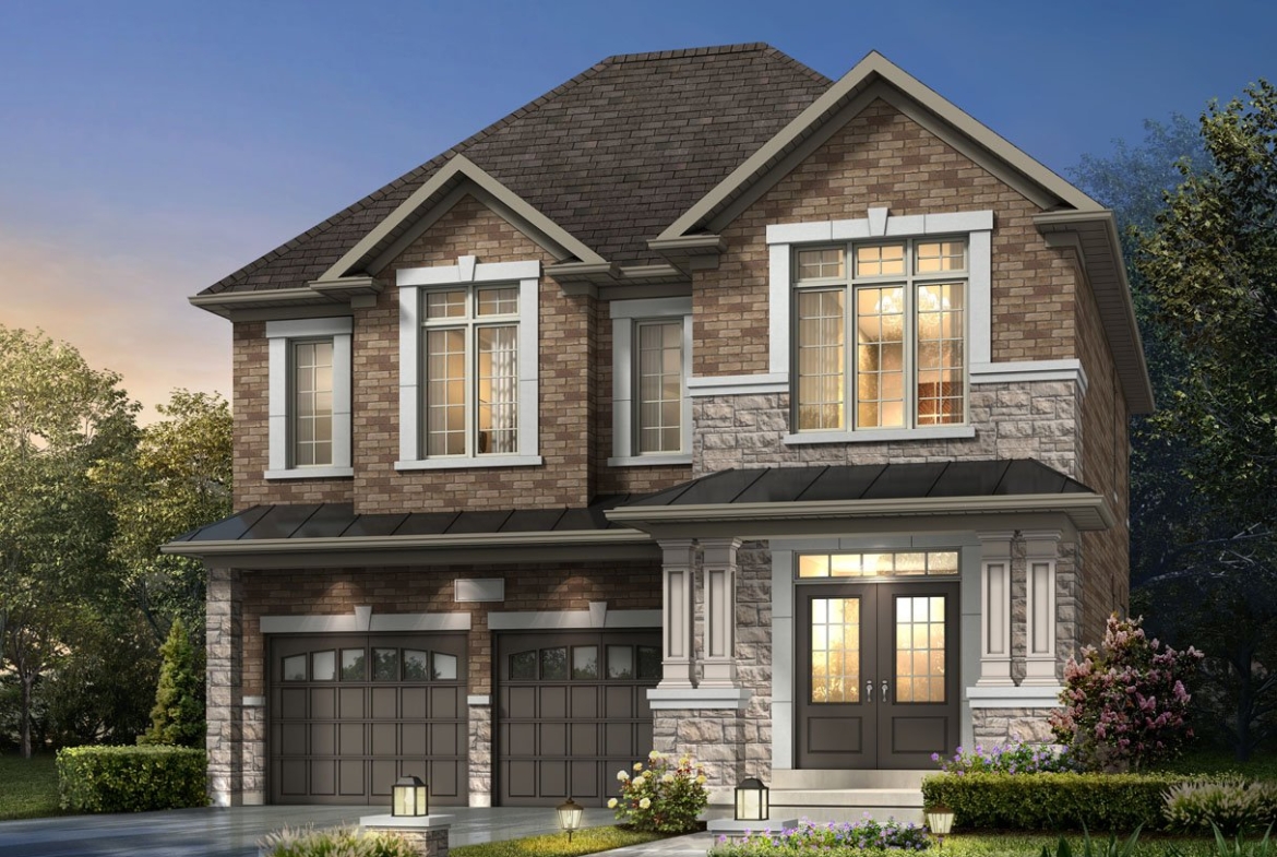 A two-story house features a brick and stone exterior, tall windows, and double garage doors. It's surrounded by a well-maintained garden and illuminated by outdoor lights at dusk. This elegant design is representative of new homes in Brampton.