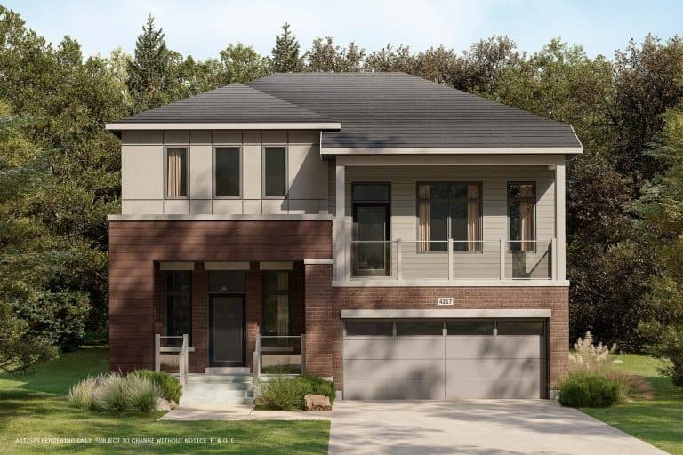 This modern two-story house boasts a brick and light-colored facade, large windows, and a two-car garage. Nestled amid trees on a neatly landscaped lawn, it beautifully harmonizes with its surroundings, reflecting the spirit of conservation.