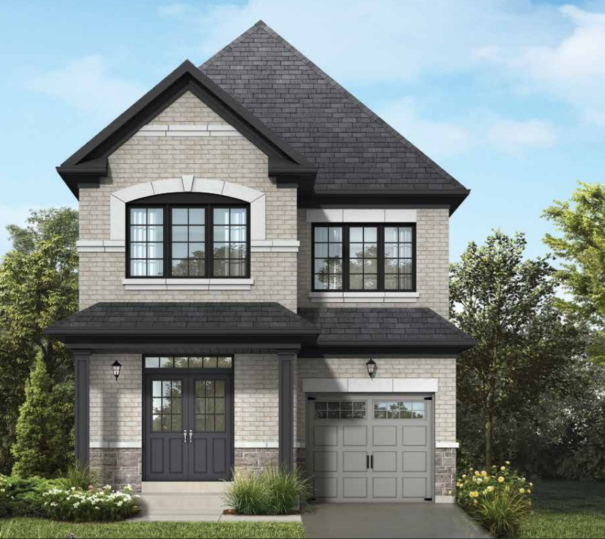A two-story house with a pointed roof, brick exterior, and large windows. The garage is on the right, and the entrance is on the left with a small porch. The front yard boasts green grass and bushes beneath a clear blue sky—a perfect example of new homes in Brampton.