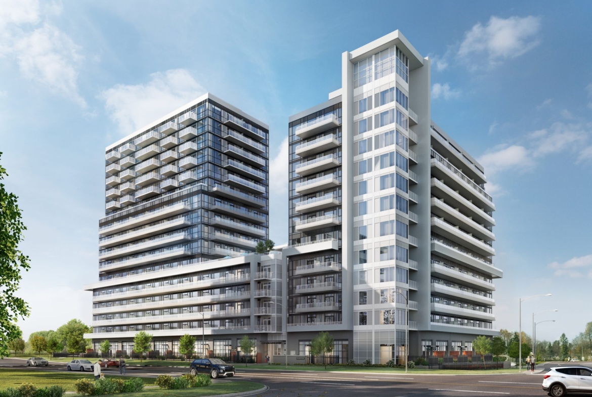 Discover a sleek apartment complex boasting two tall buildings with glass balconies. These new condos in GTA are nestled amid lush greenery and beneath a clear blue sky. Cars are conveniently parked out front, while elegant trees line the street.