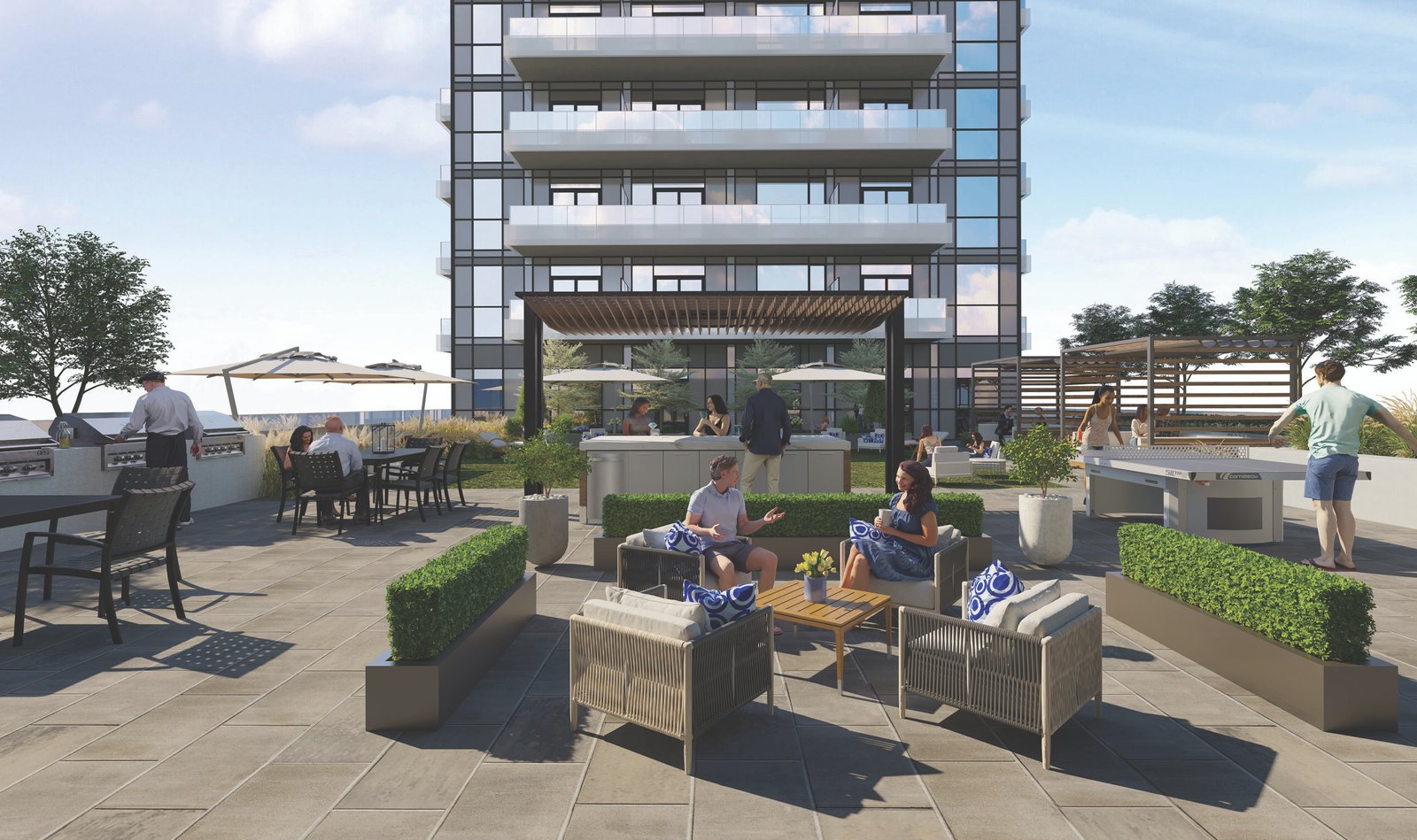 The rooftop terrace offers a lively space with people relaxing on patio furniture amidst lush plants. A modern building adds to the backdrop, while colorful umbrellas and tables dot the scene. The bright atmosphere showcases a clear sky, perfect for enjoying views of new condos in GTA. The rooftop terrace offers a lively space with people relaxing on patio furniture amidst lush plants. A modern building adds to the backdrop, while colorful umbrellas and tables dot the scene. The bright atmosphere showcases a clear sky, perfect for enjoying views of new condos in GTA.