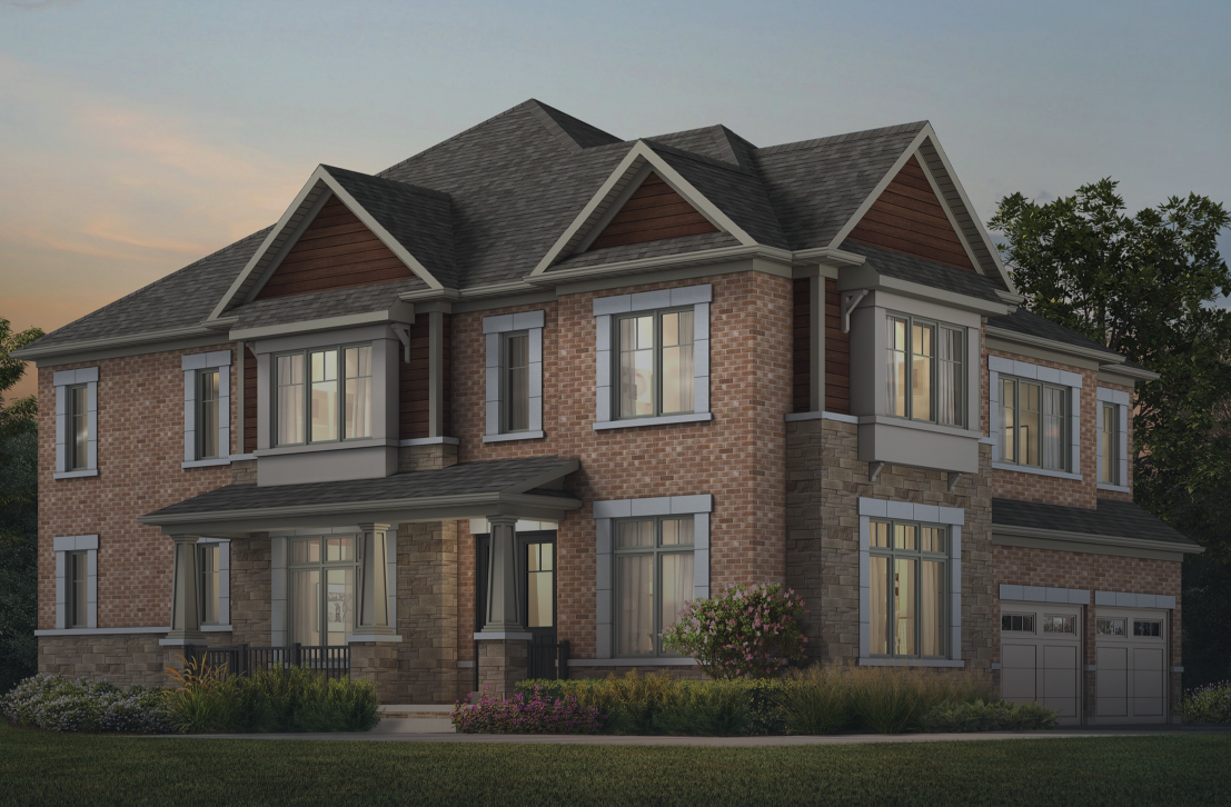 Discover this two-story brick house with a dark gray roof, large windows, and a double garage. The front porch complements the well-maintained landscaping of bushes and flowers. Perfect for those seeking new homes in Brampton, with the evening sky faintly visible in the background.