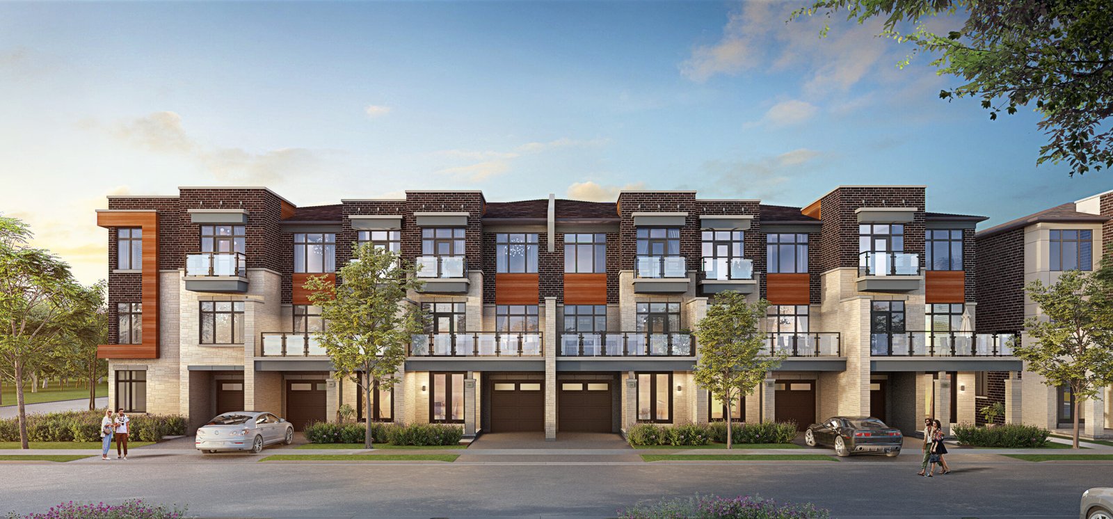 A modern three-story townhouse complex with large windows and balconies features a mix of stone and wood accents. Three cars are parked in front, and a few trees line the street under a clear blue sky. Discover pre-construction homes that offer style and comfort in this picturesque setting. A modern three-story townhouse complex with large windows and balconies features a mix of stone and wood accents. Three cars are parked in front, and a few trees line the street under a clear blue sky. Discover pre-construction homes that offer style and comfort in this picturesque setting.