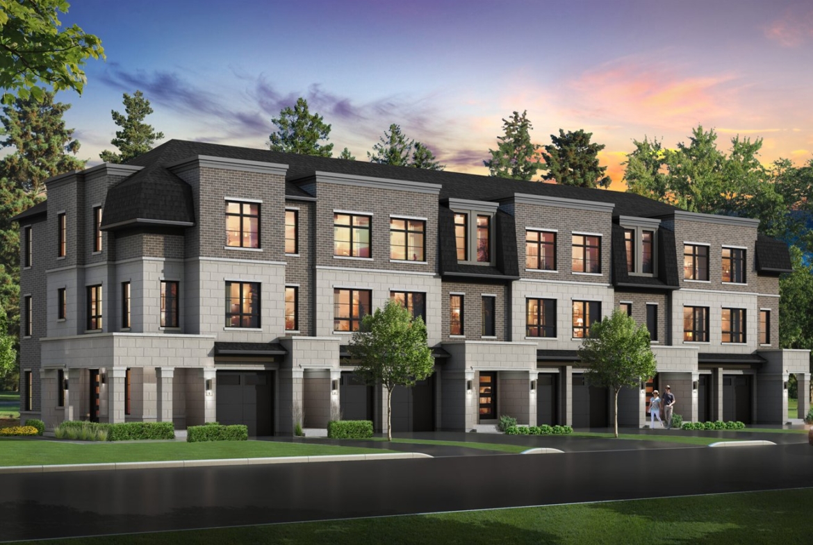 Set against a vibrant sunset sky, this modern three-story townhouse complex in Brampton boasts large windows and a striking brick exterior. Surrounded by tall trees, it offers the charm of new condos while a car is parked neatly to the right.
