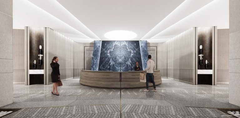 A modern hotel lobby features a circular reception desk with two people engaged in conversation. In the background, a large marble wall mirrors the elegance found in pre-construction homes. The floor is a patterned mix of tiles, and soft lighting illuminates the space.