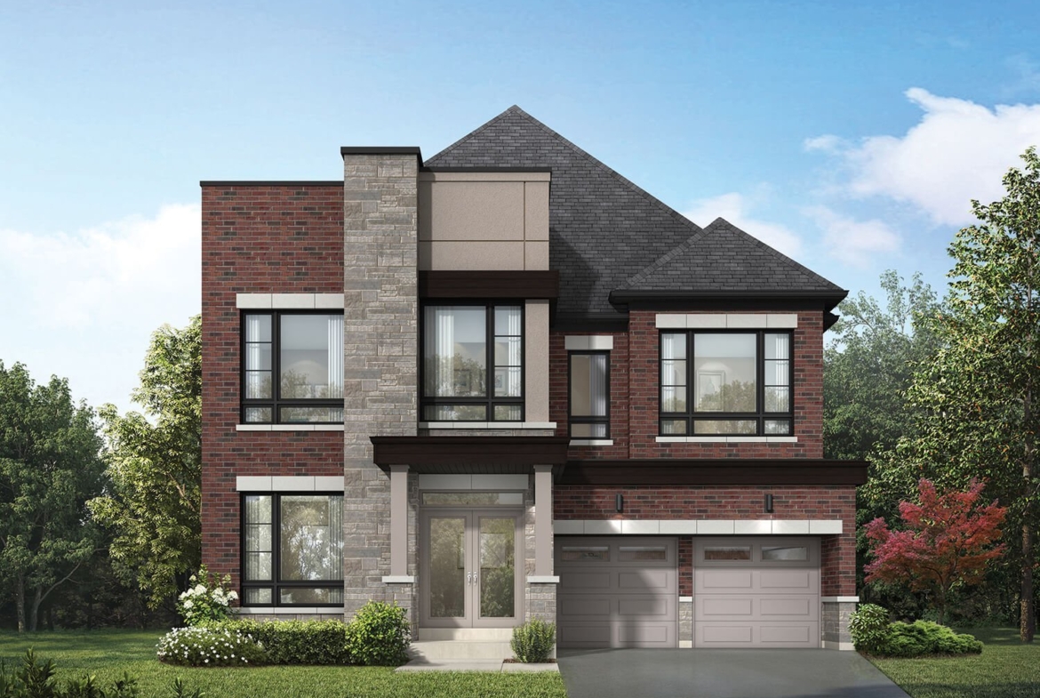 Unionville Upper East Homes A modern two-story house in Unionville featuring a combination of red brick and stone facade. Large windows dominate the front, along with a two-car garage and a manicured lawn. The sky is clear with a few scattered clouds, and trees surround the property, adding greenery.