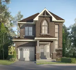 New two-story brick townhome with attached garage and front porch, located in the 16 Mile Creek Towns real estate development.