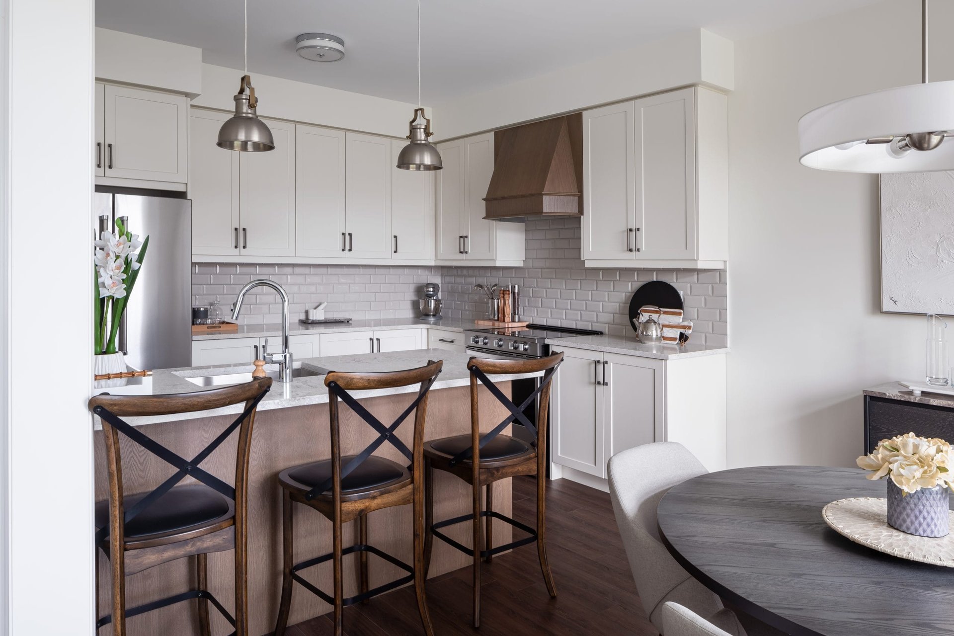 Modern kitchen layout featuring custom cabinetry and premium appliances at Empire Calderwood