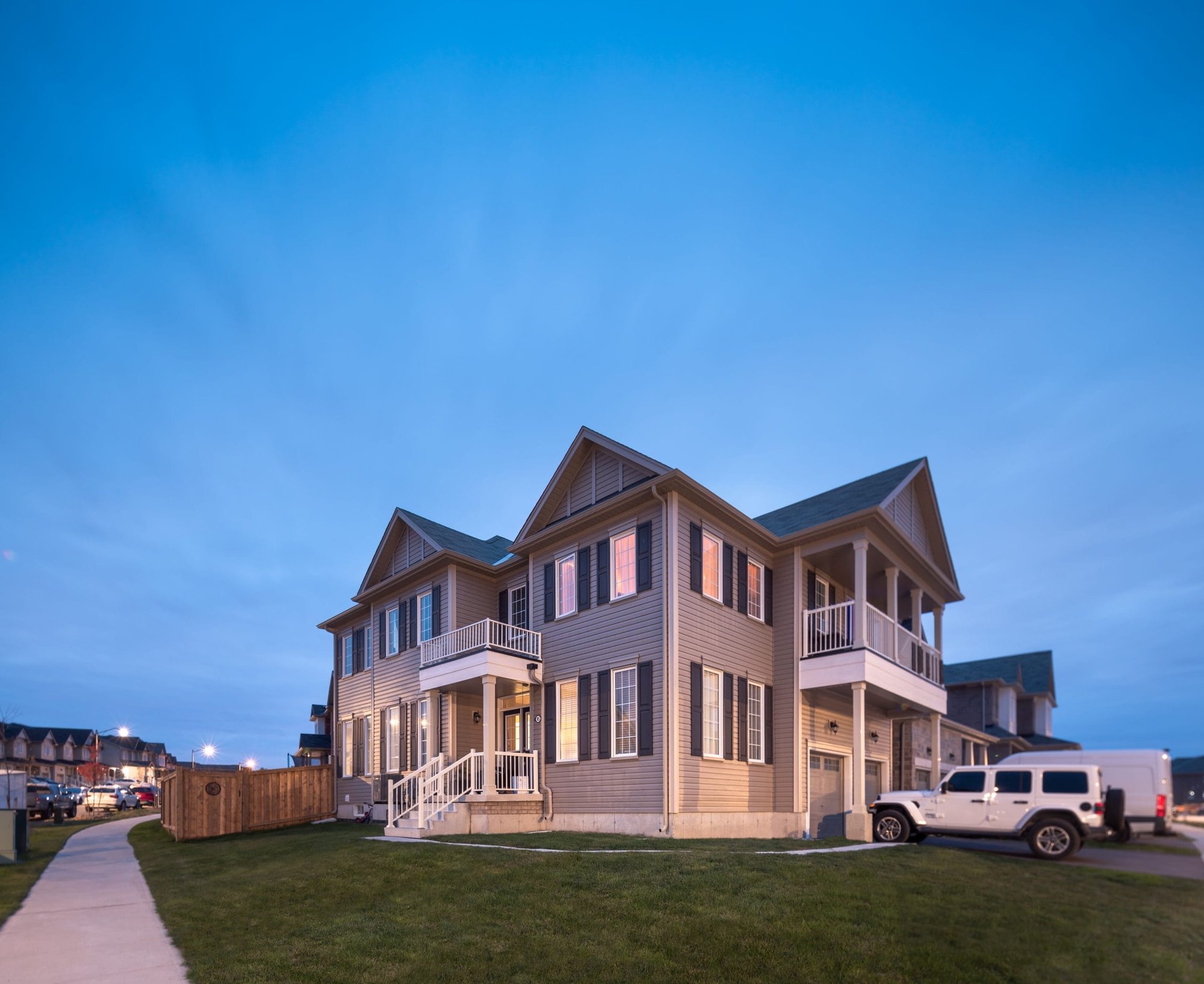 Empire Riverland Detached Single-Family Architecture Contemporary detached single-family home with double-car garage at Empire Riverland