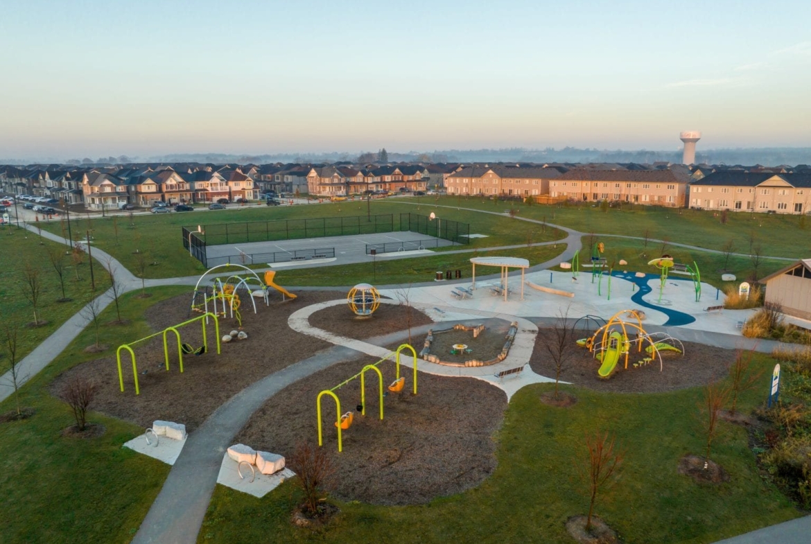 Family-friendly community playground and neighbourhood park greenspace at Empire Wyndfield