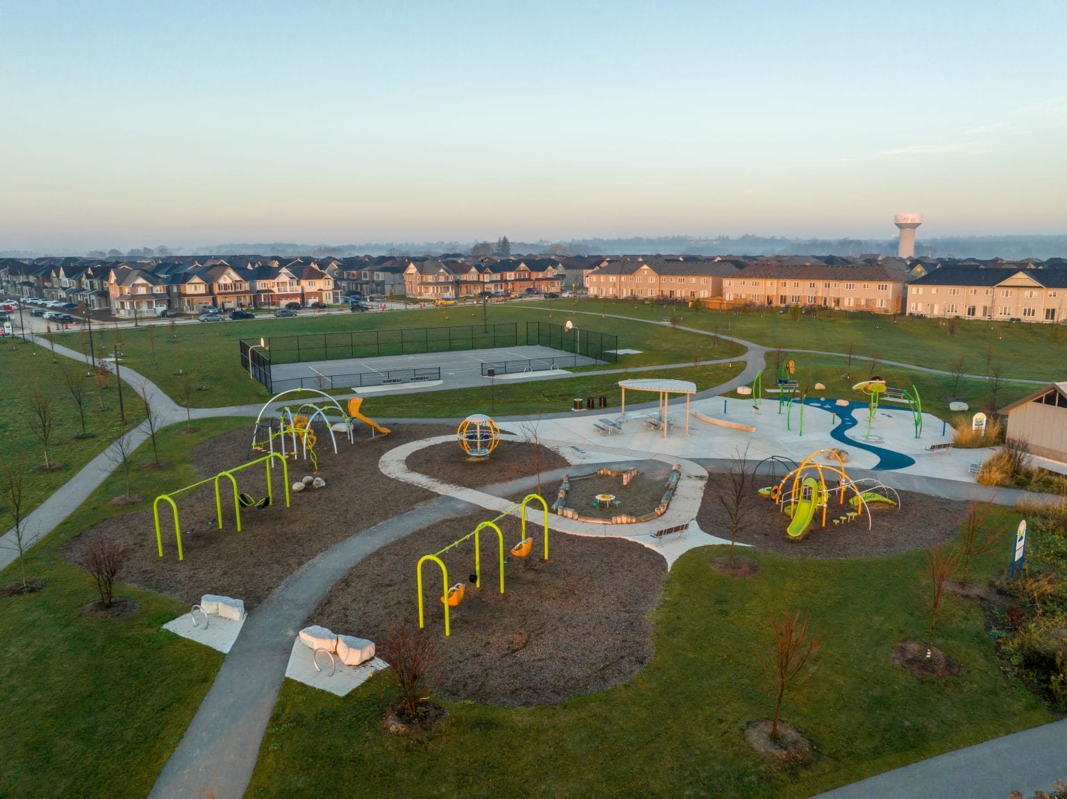 Family-friendly community playground and neighbourhood park greenspace at Empire Wyndfield