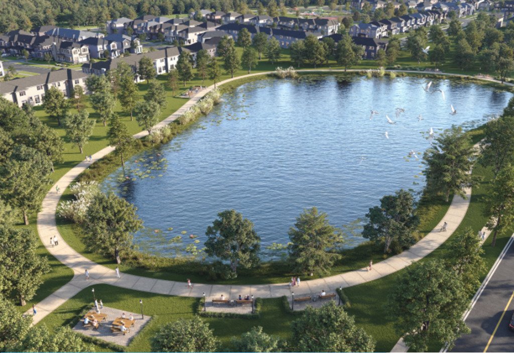 Aerial view of North Hill master-planned community and surrounding conservation land in Bolton